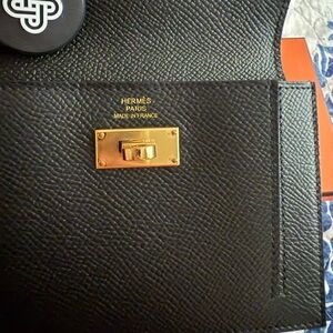 Authentic Hermes Kelly compact wallet in black